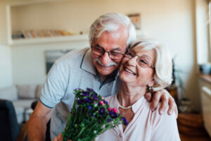 smiling elderly couple